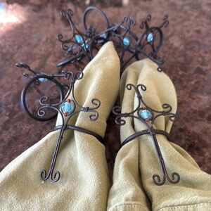 Napkin Ring Holders Set Of 8 Black Cross W/blue Stone Metal . Great condition.